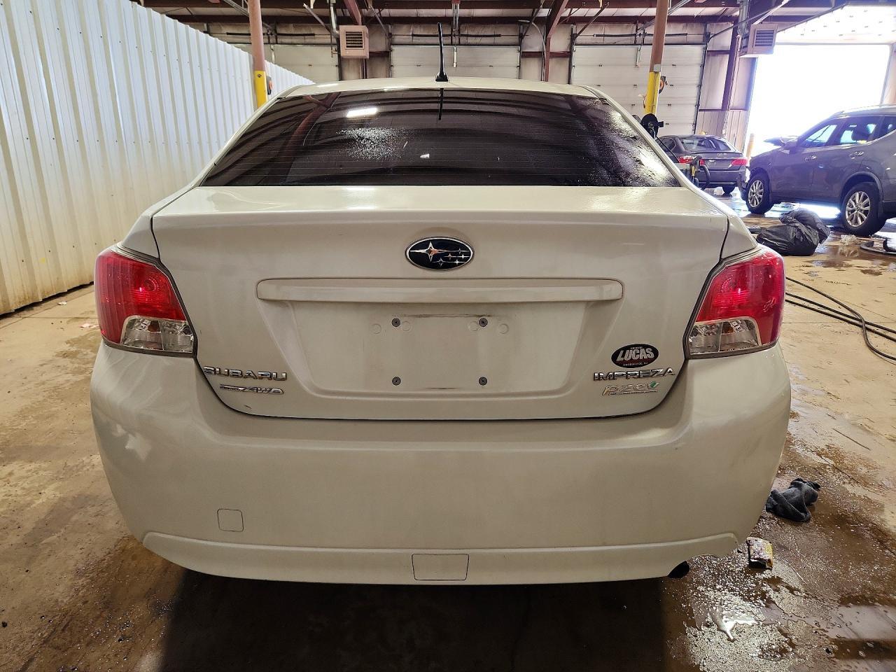 2014 Subaru Impreza Premium - Фото 6