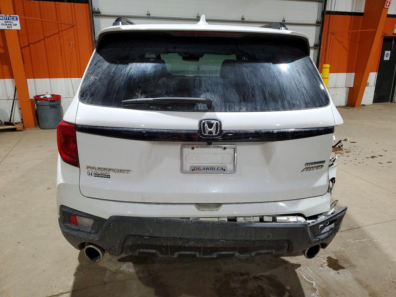 2023 Honda Passport Touring 4Dr - Фото 6