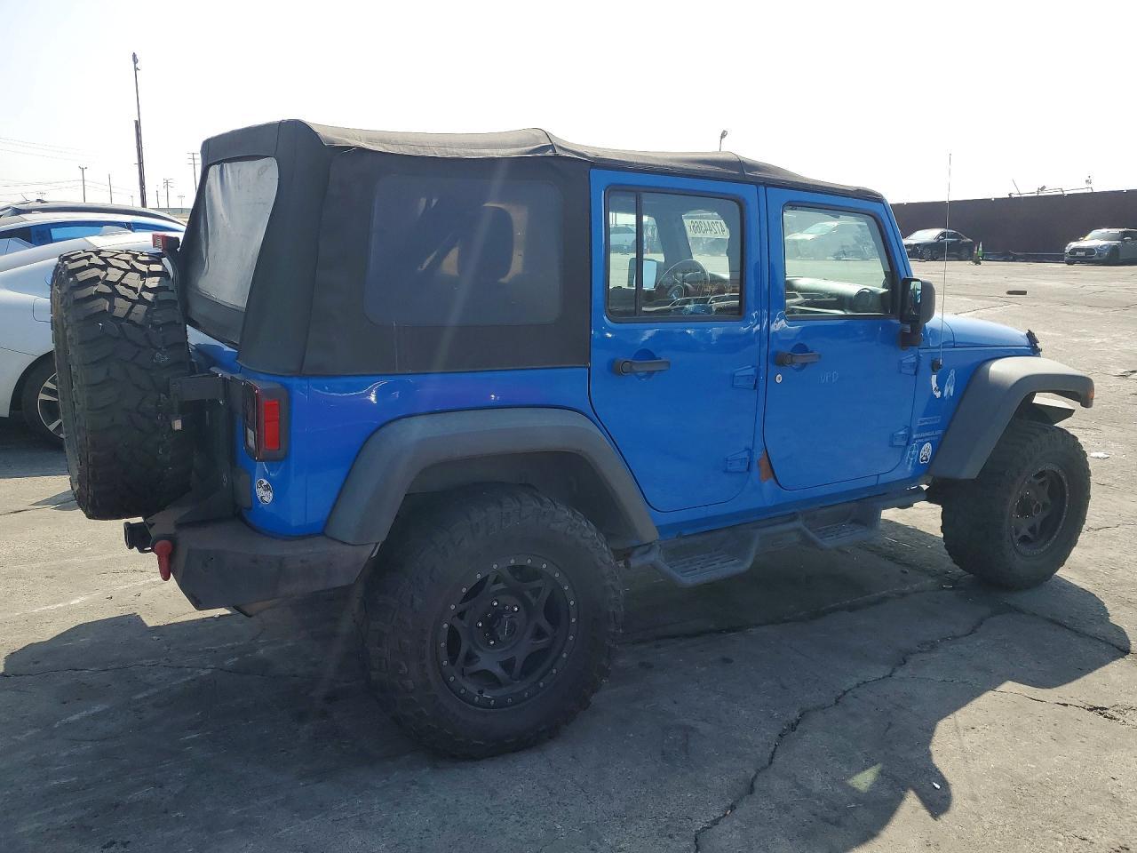 2012 Jeep Wrangler Unlimited Sport - Image 3