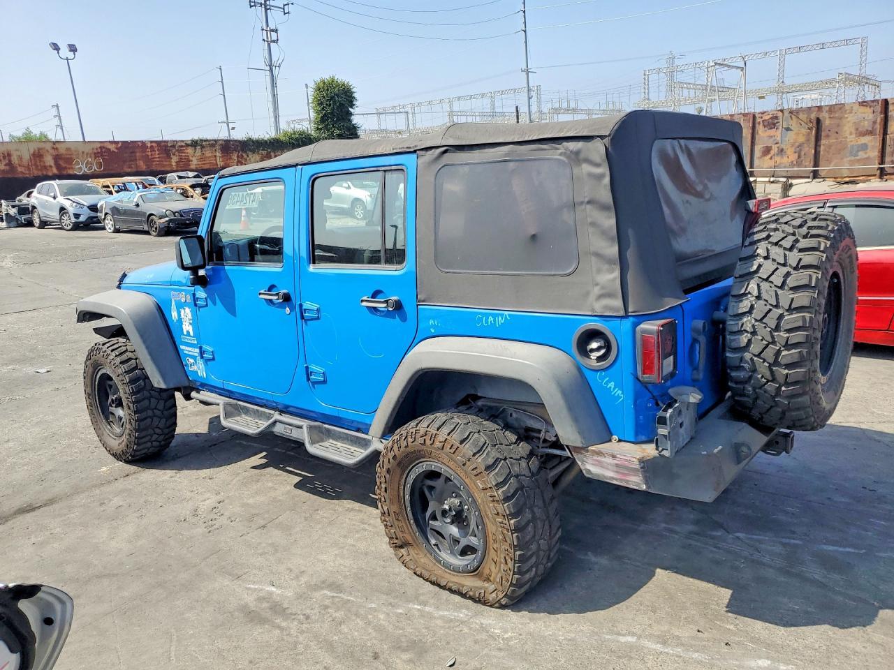 2012 Jeep Wrangler Unlimited Sport - Image 2