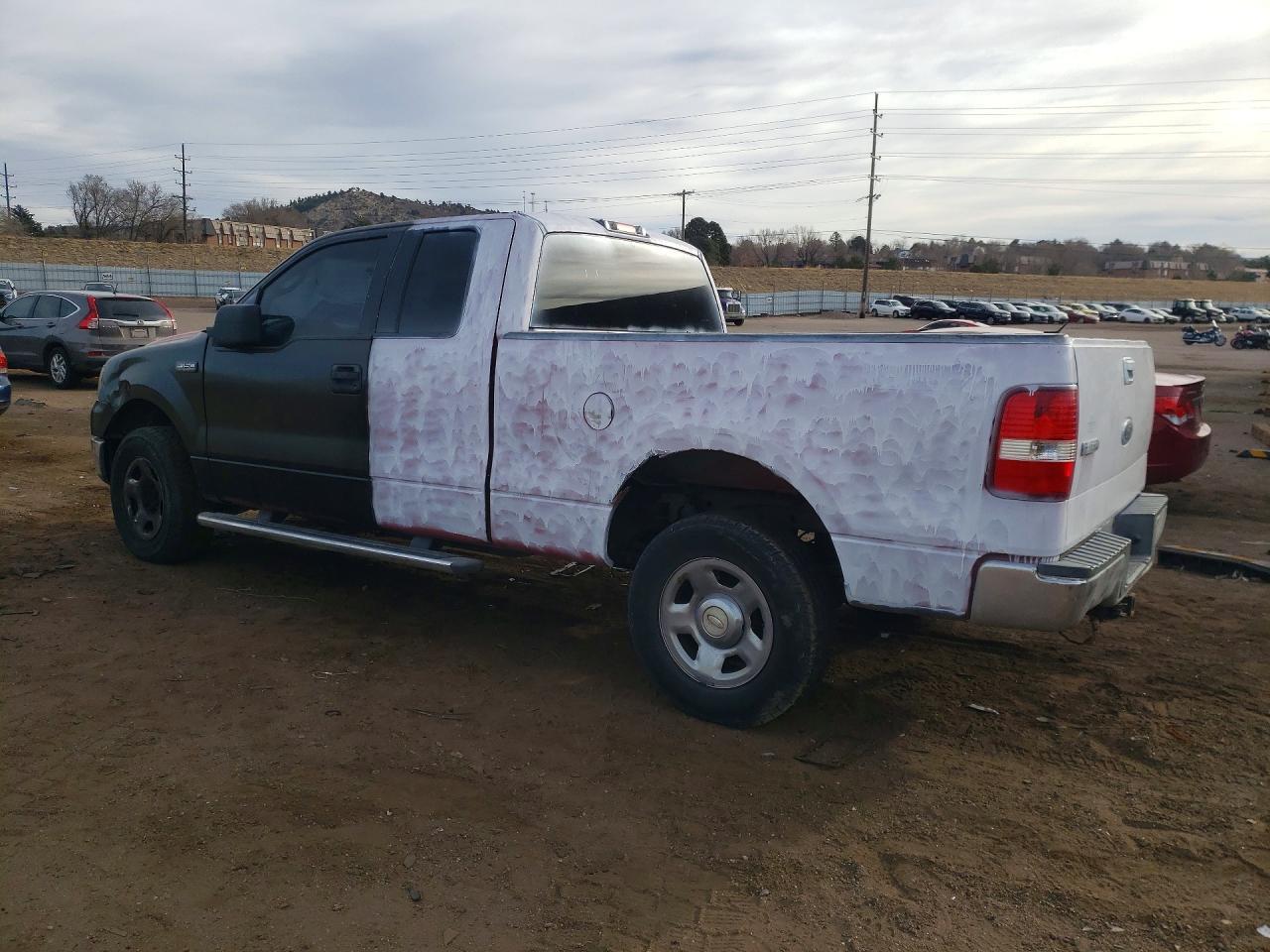2005 Ford F150 - Фото 2