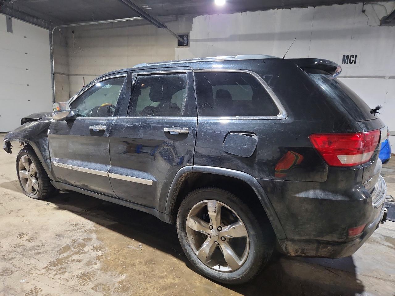 2013 Jeep Grand Cherokee Overland - Фото 2