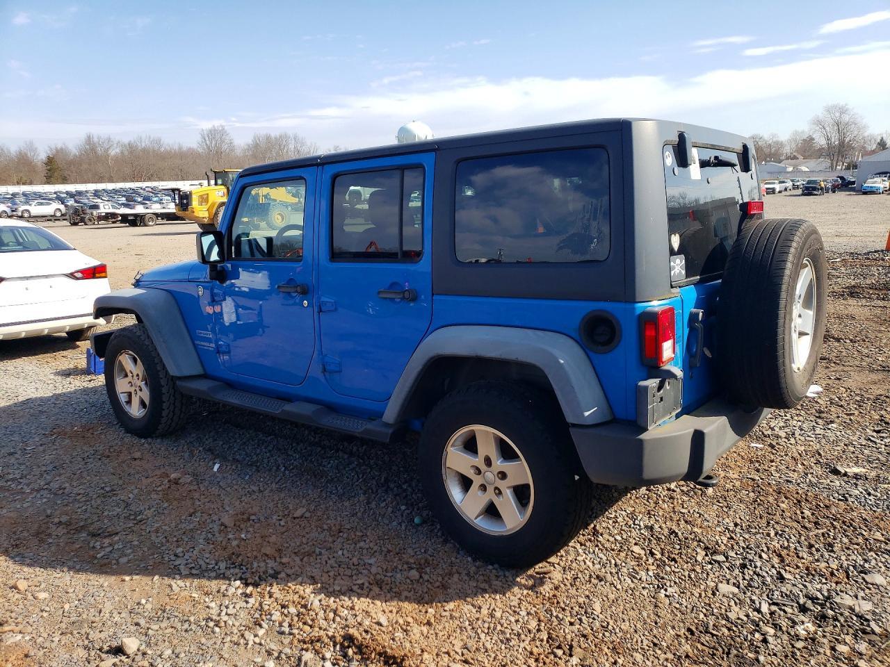 2011 Jeep Wrangler Unlimited Sport - Фото 2