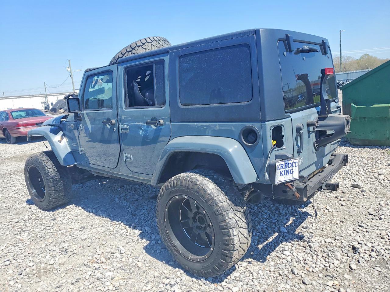 2014 Jeep Wrangler Unlimited Sahara - Фото 2