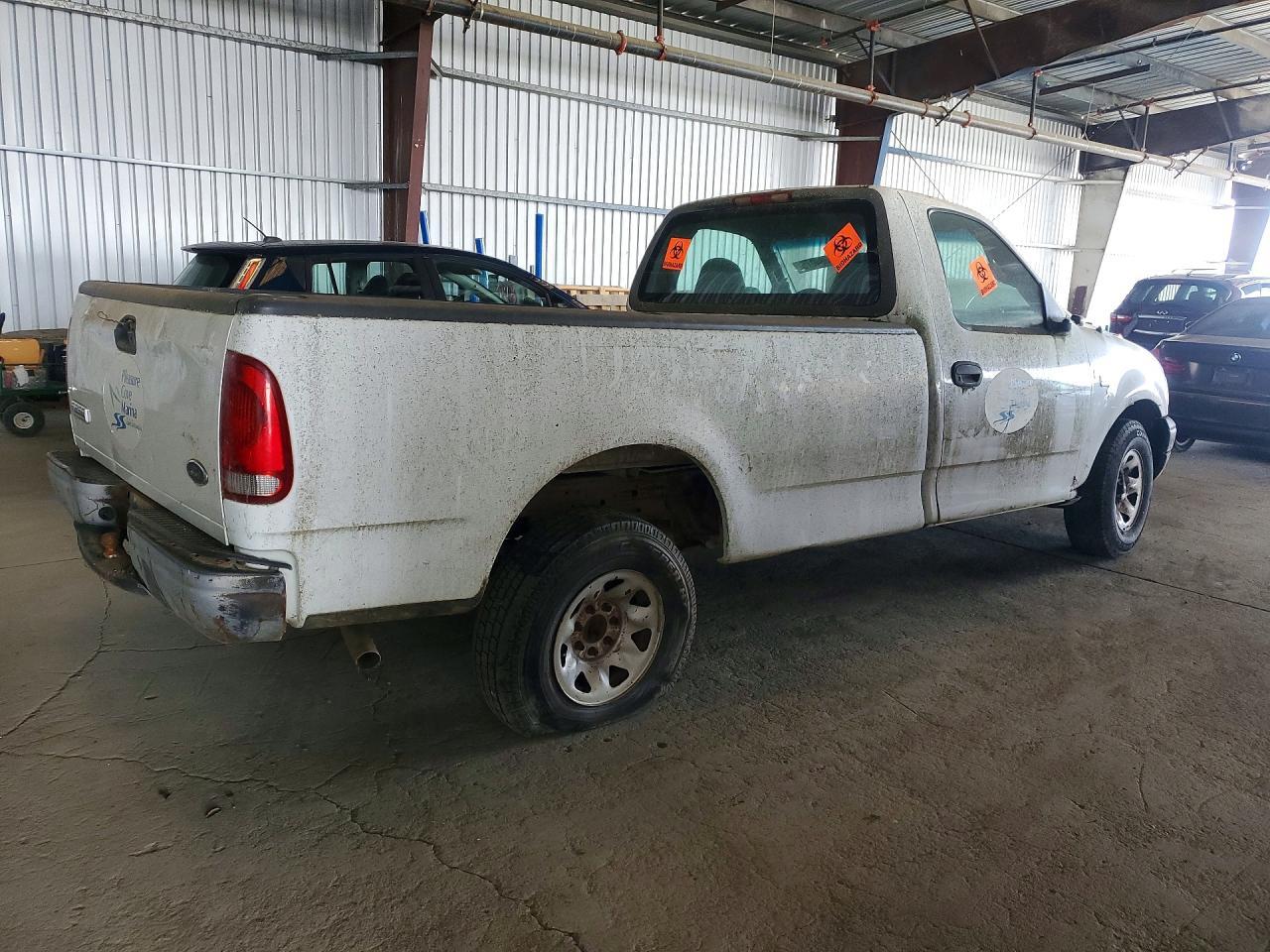 2001 Ford F150 - Фото 3