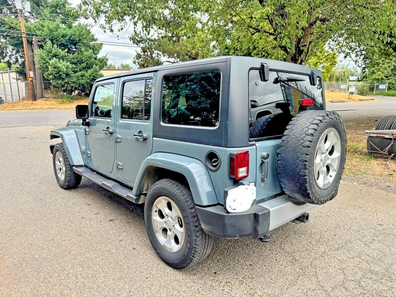 2014 Jeep Wrangler Unlimited Sahara - Фото 3