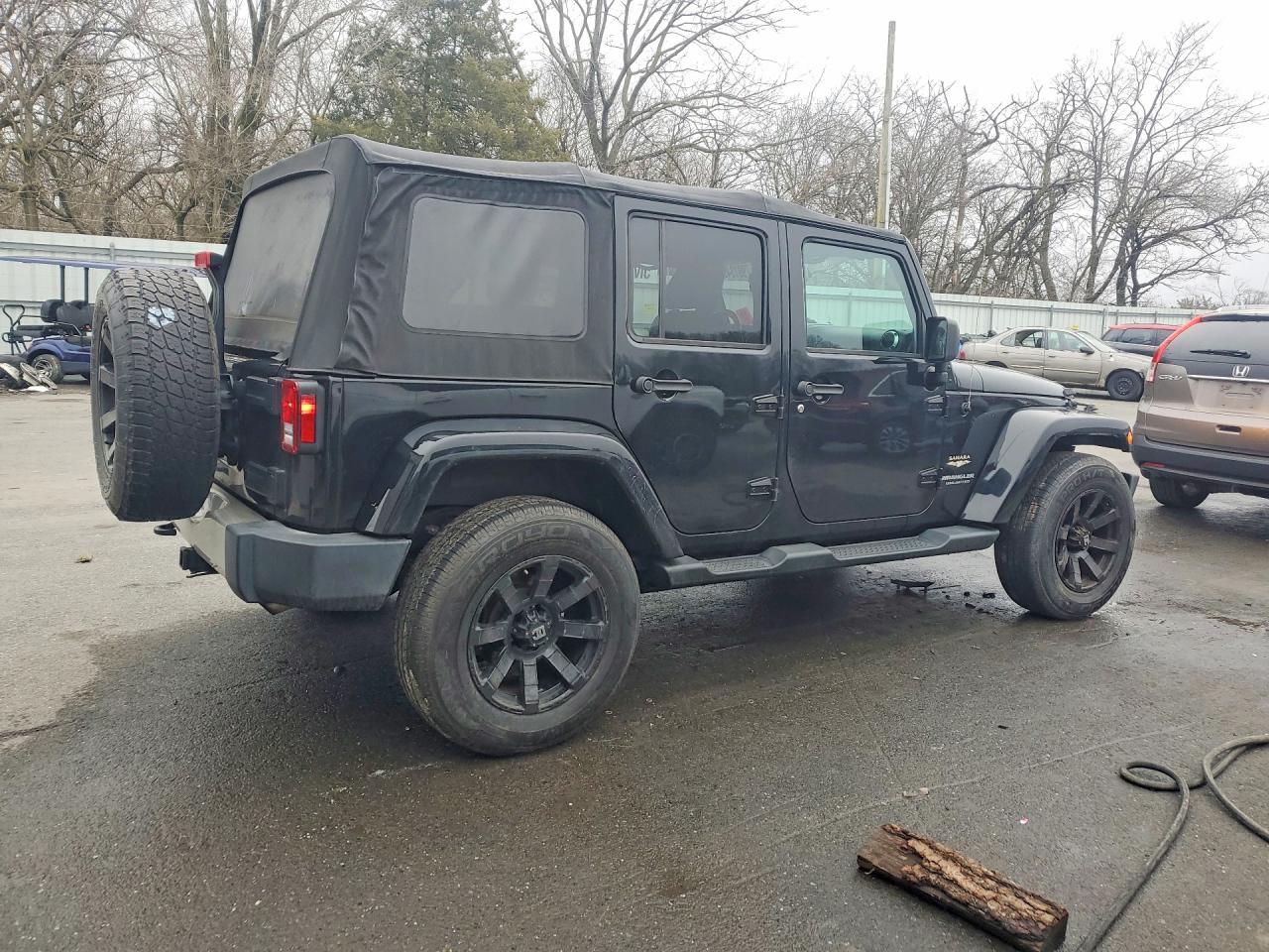 2015 Jeep Wrangler Unlimited Sahara - Фото 3