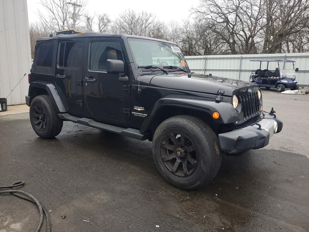 2015 Jeep Wrangler Unlimited Sahara - Фото 4