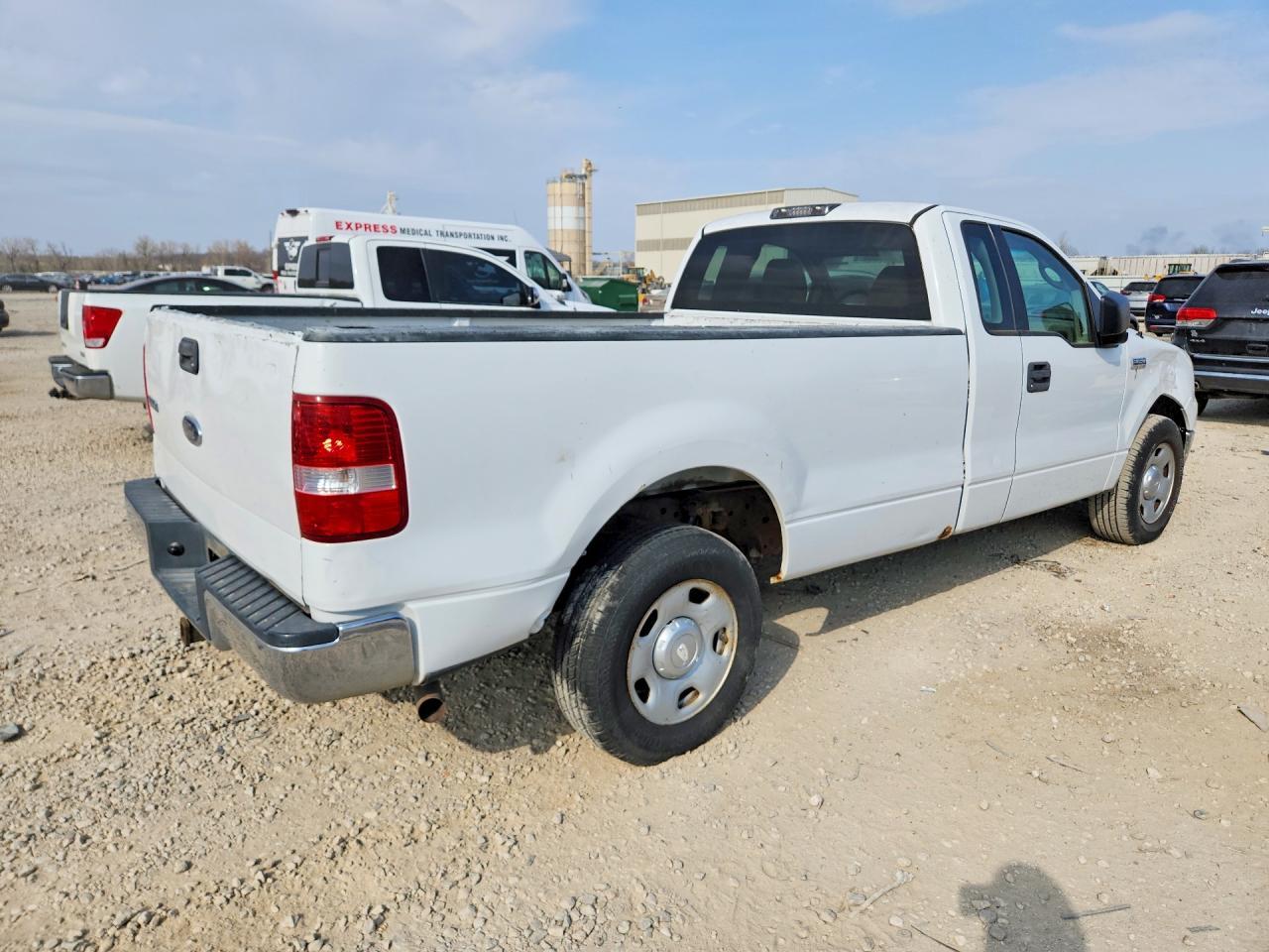 2004 Ford F150 - Фото 3