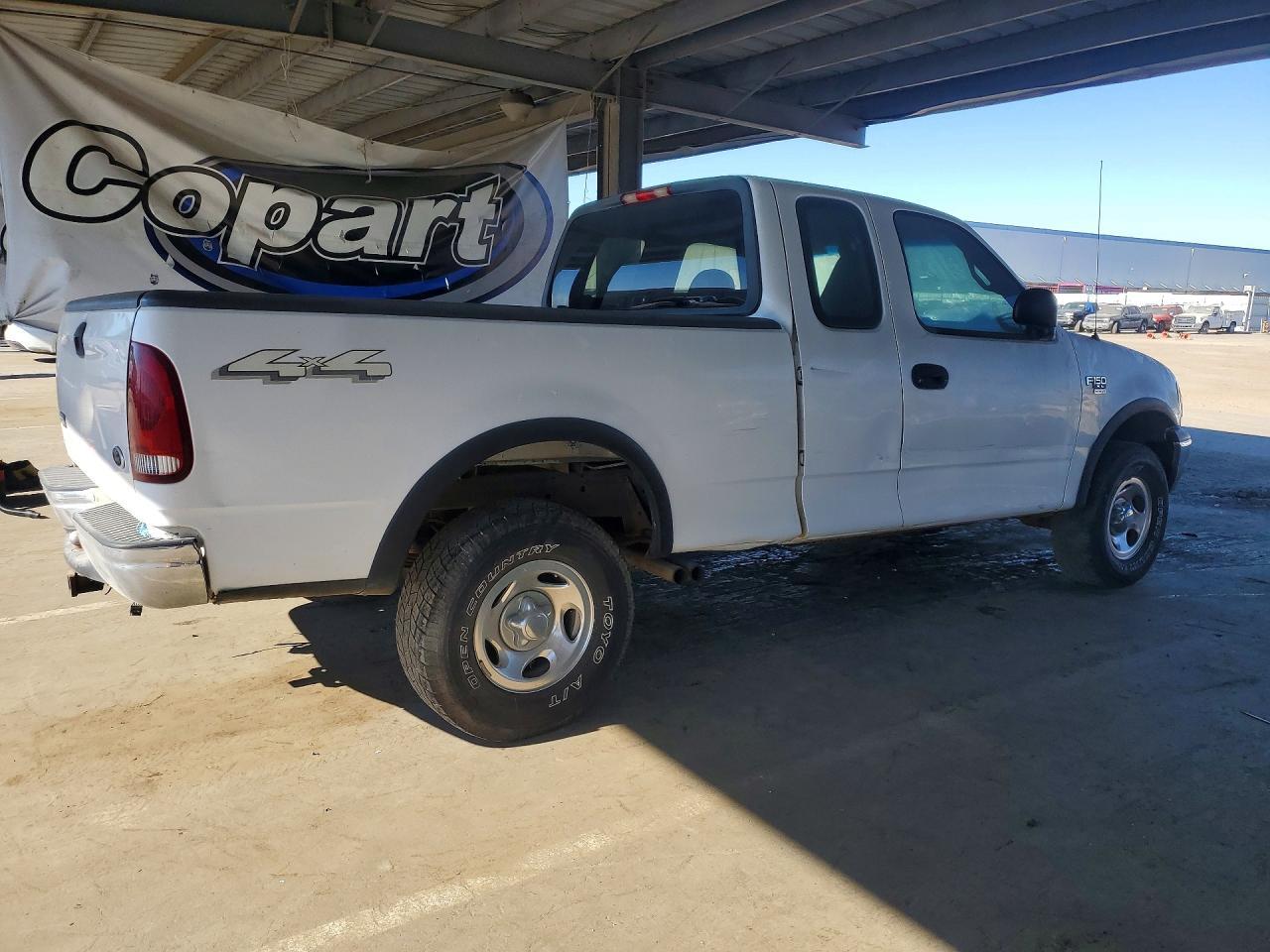 2002 Ford F150 - Фото 3