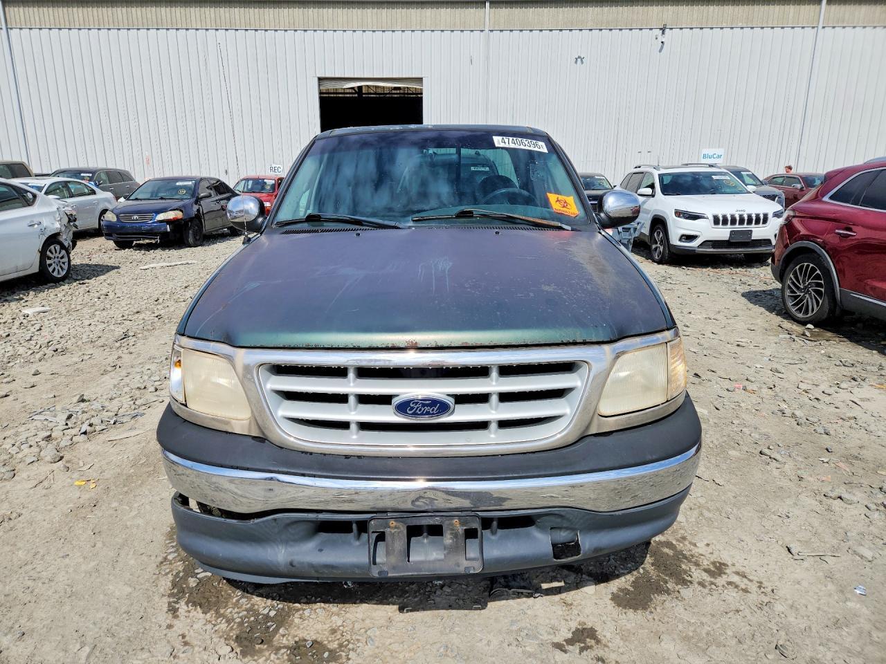 1999 Ford F150 - Фото 5