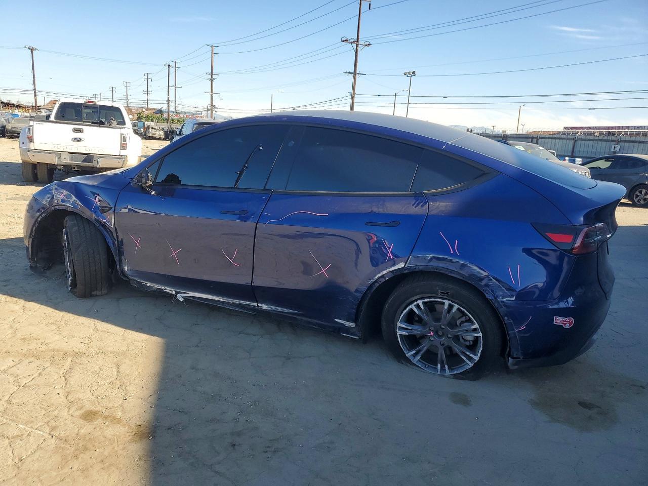 2024 Tesla Model Y - Фото 2
