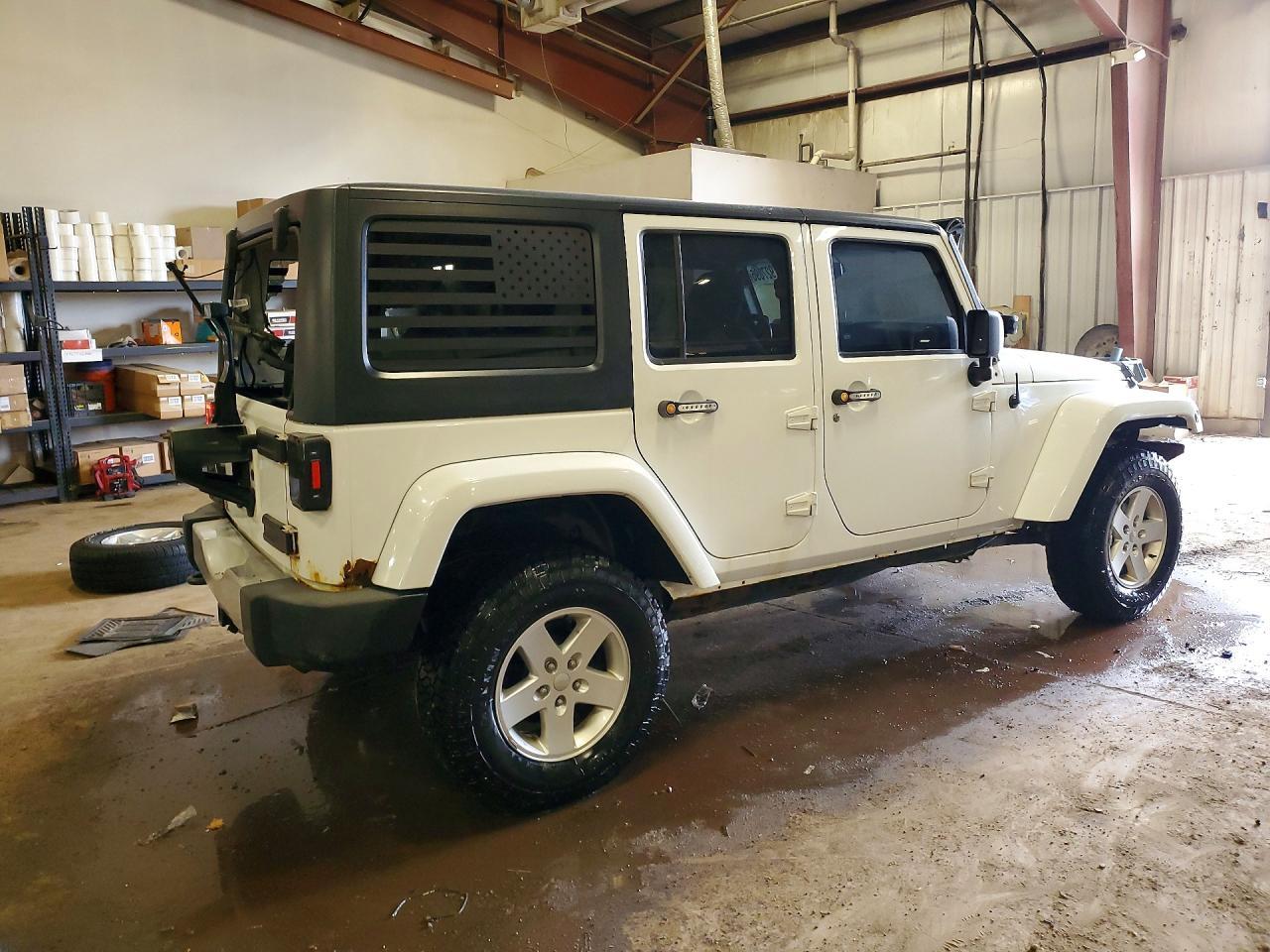 2014 Jeep Wrangler Unlimited Sahara - Фото 3