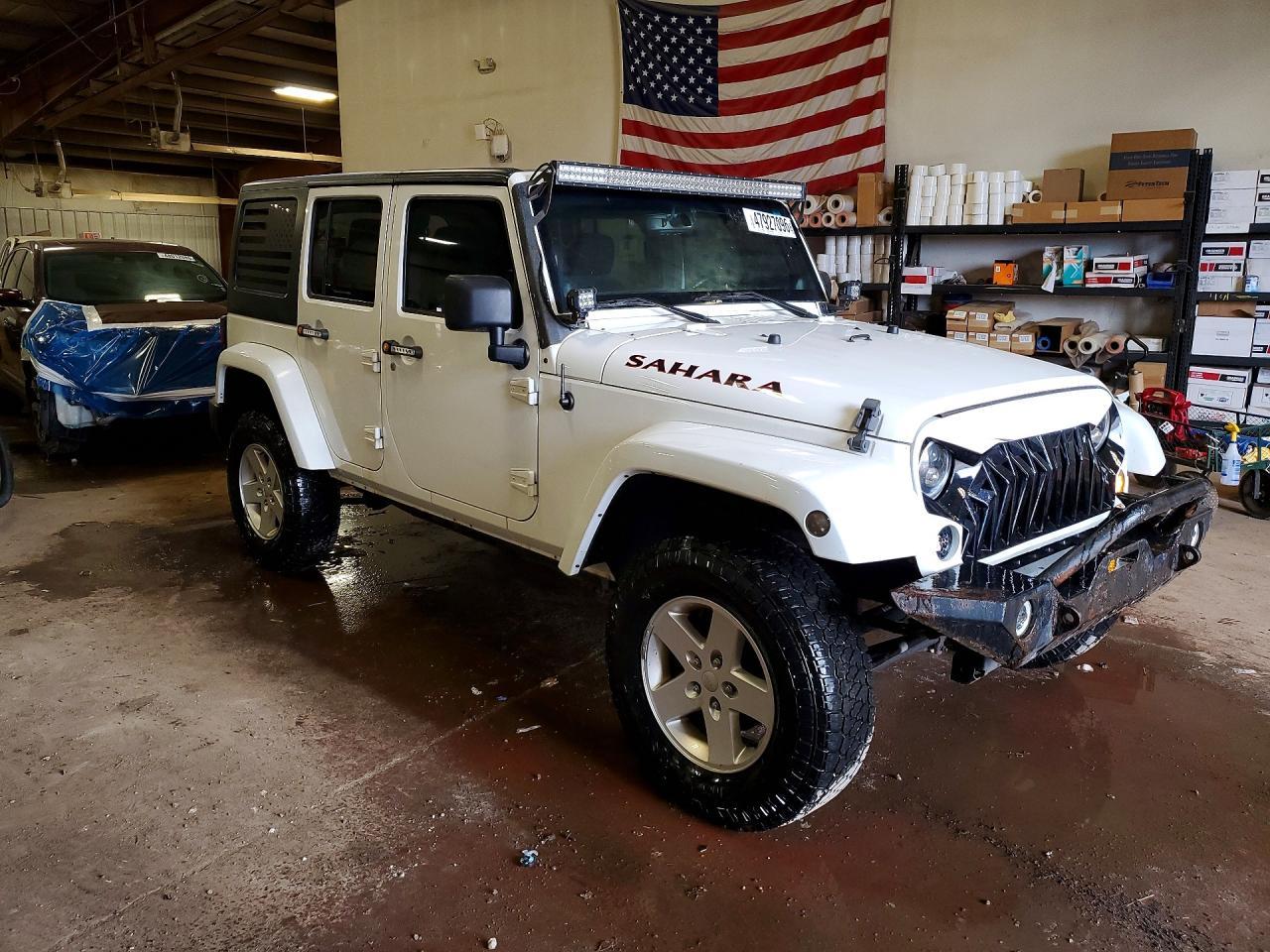2014 Jeep Wrangler Unlimited Sahara - Фото 4