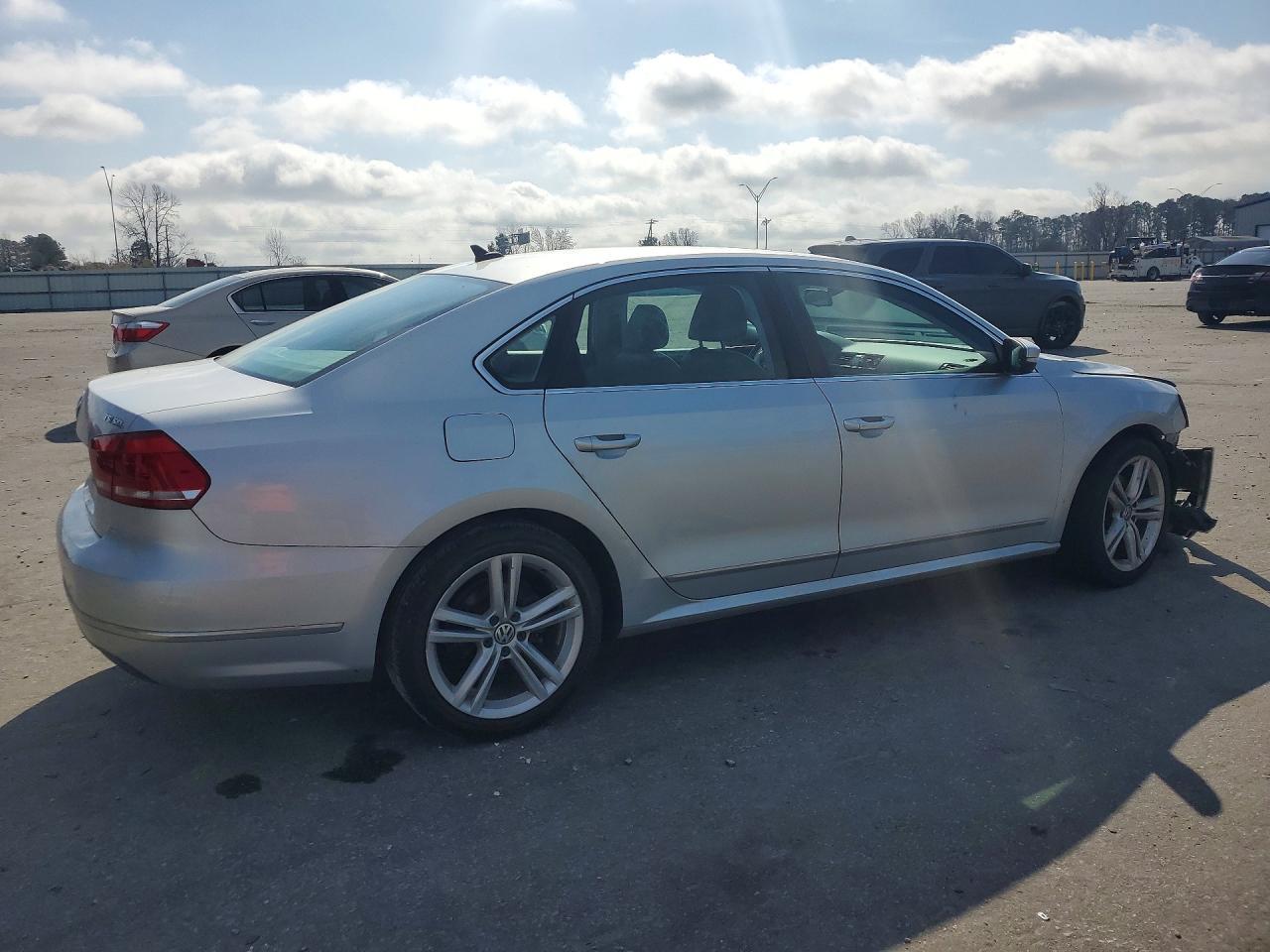 2014 Volkswagen Passat - Фото 3