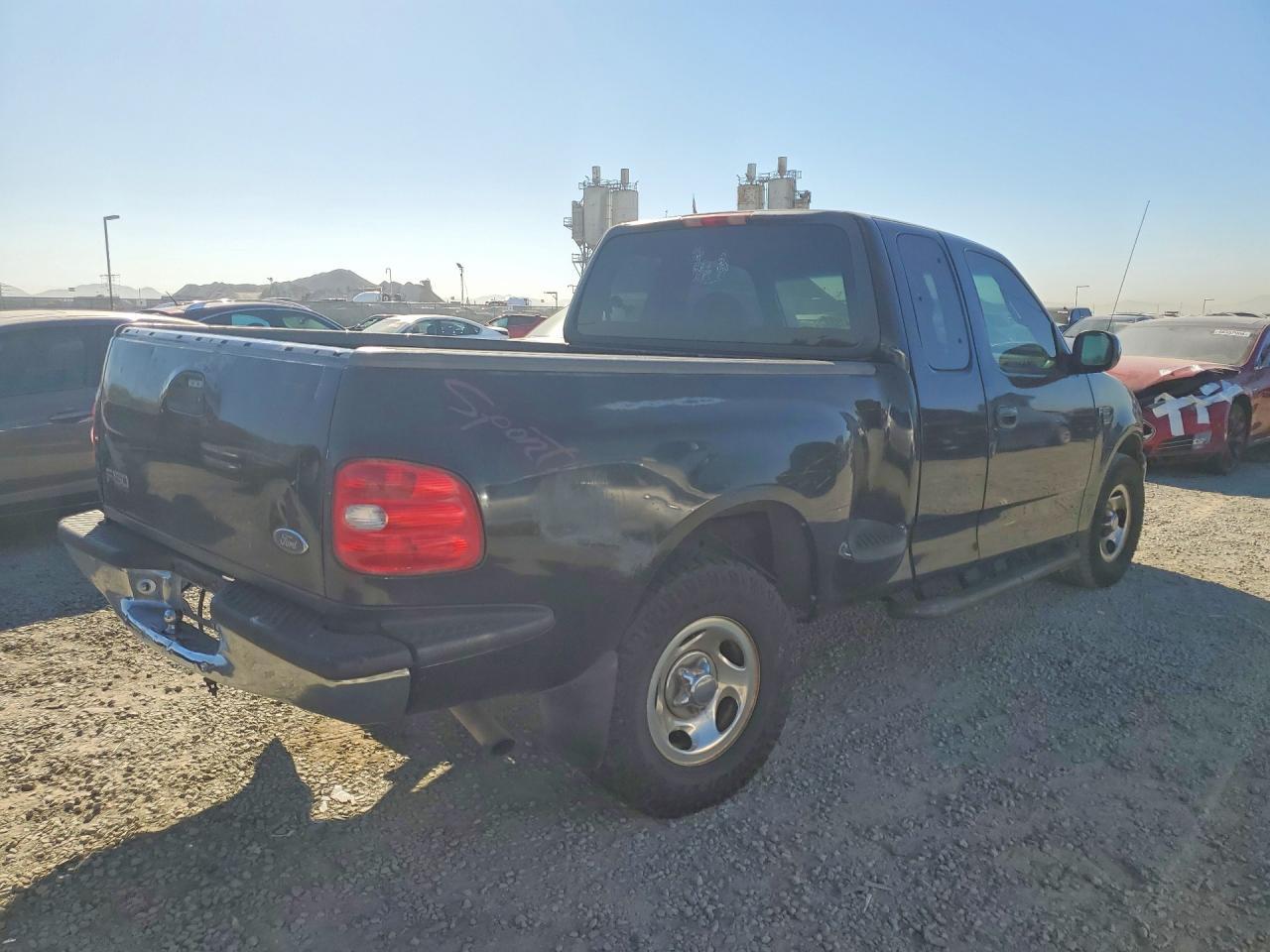 2000 Ford F150 - Фото 3