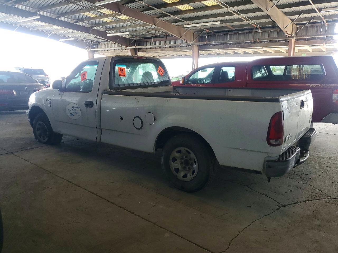 2001 Ford F150 - Фото 2