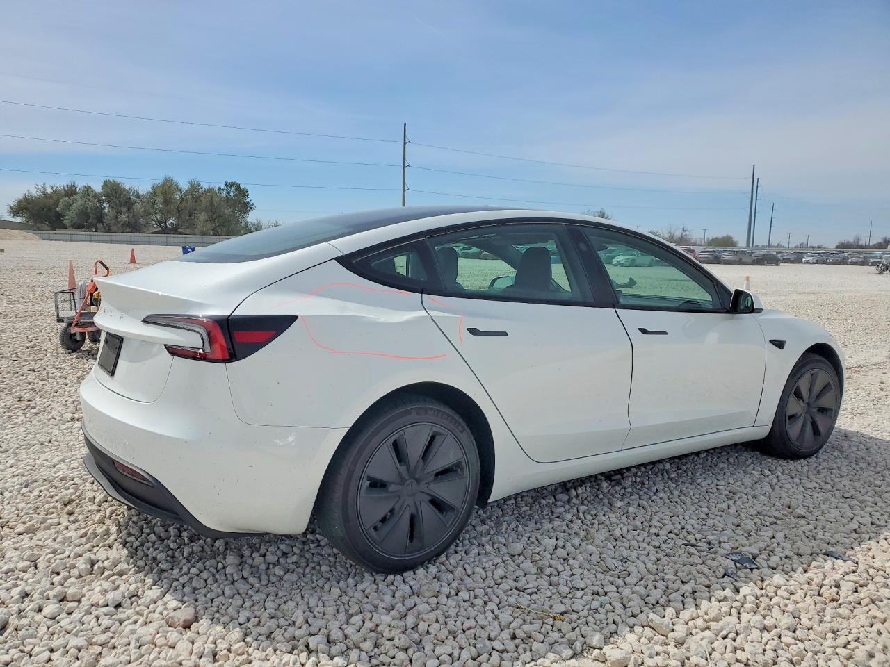 2025 Tesla Model 3 - Фото 3