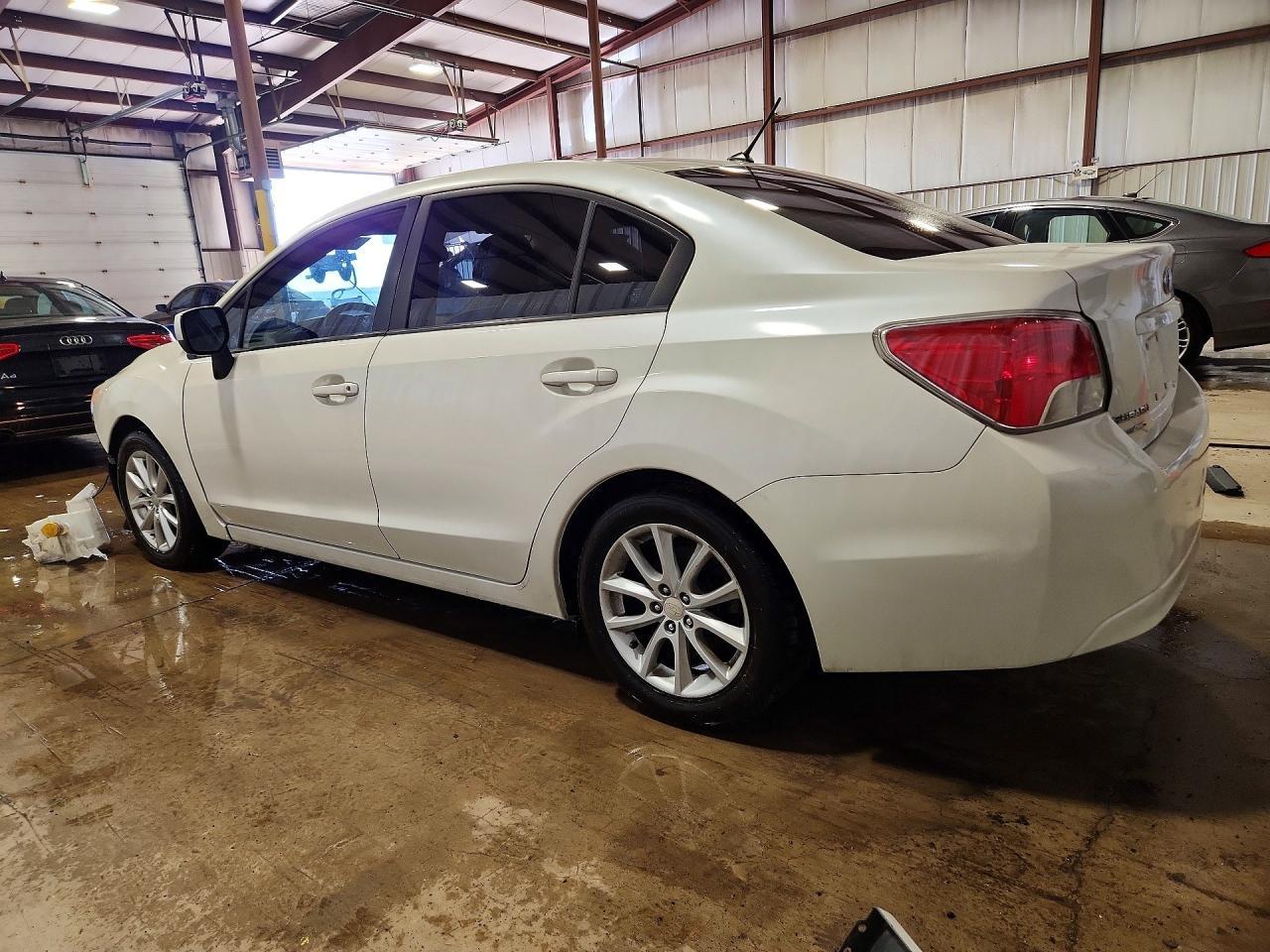 2014 Subaru Impreza Premium - Фото 2