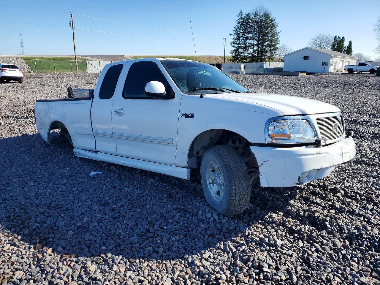 2003 Ford F150 - Фото 4