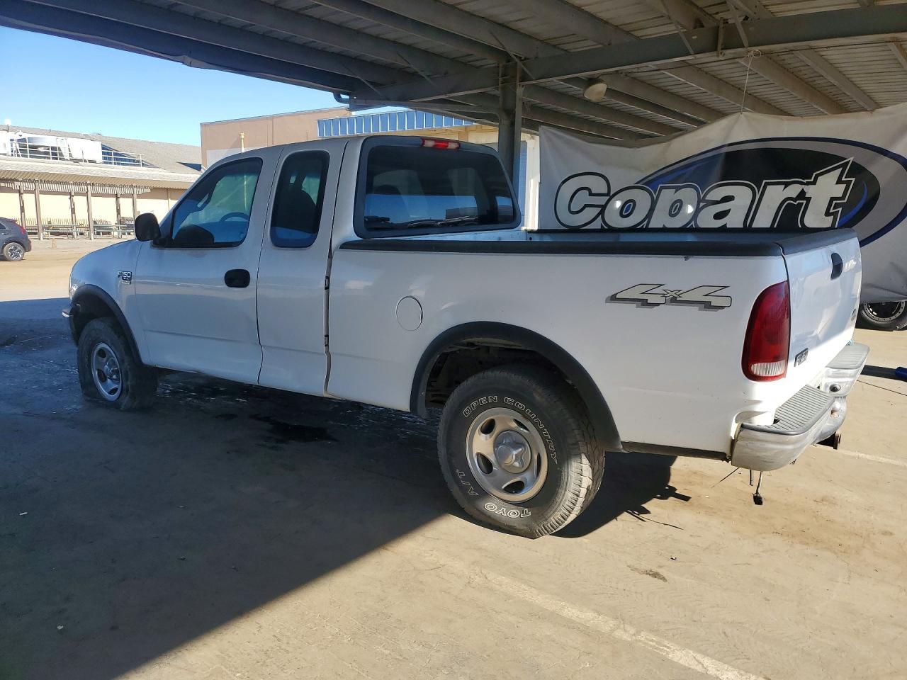 2002 Ford F150 - Фото 2