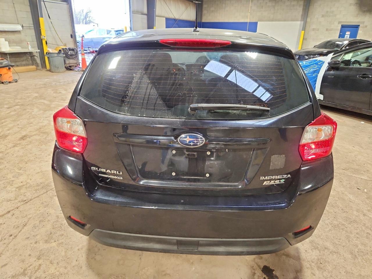 2014 Subaru Impreza - Фото 6