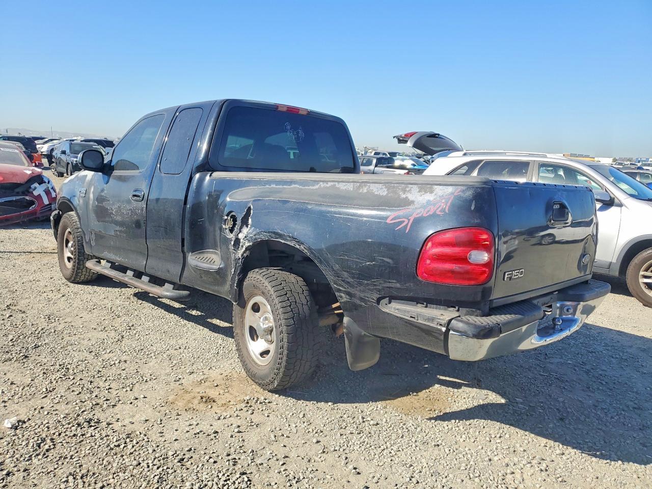 2000 Ford F150 - Фото 2