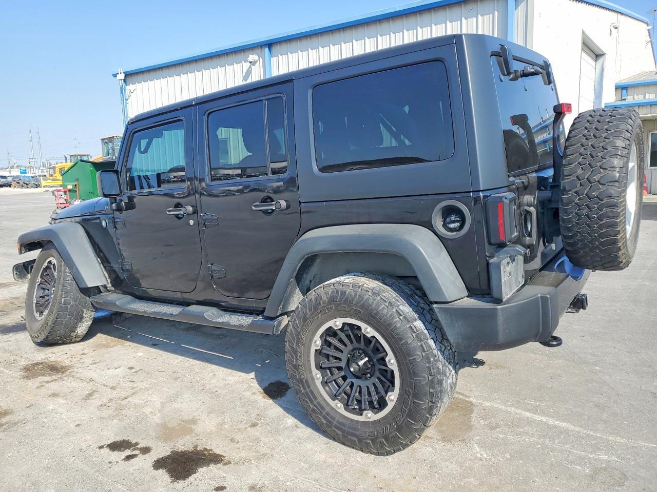 2015 Jeep Wrangler Unlimited Sport - Фото 2