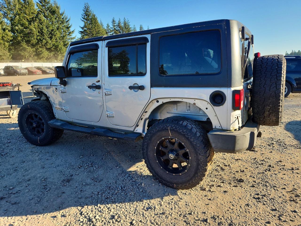 2011 Jeep Wrangler Unlimited Sport - Фото 2