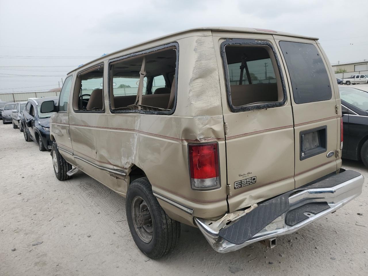 1999 Ford Econoline E350 Super Duty Wagon - Фото 2