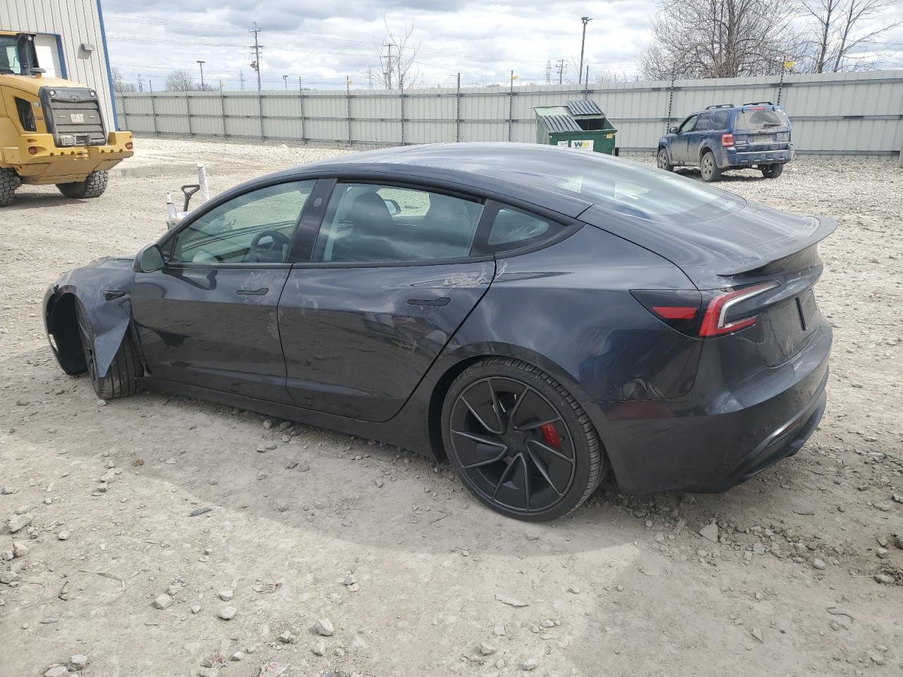 2025 Tesla Model 3 - Фото 2