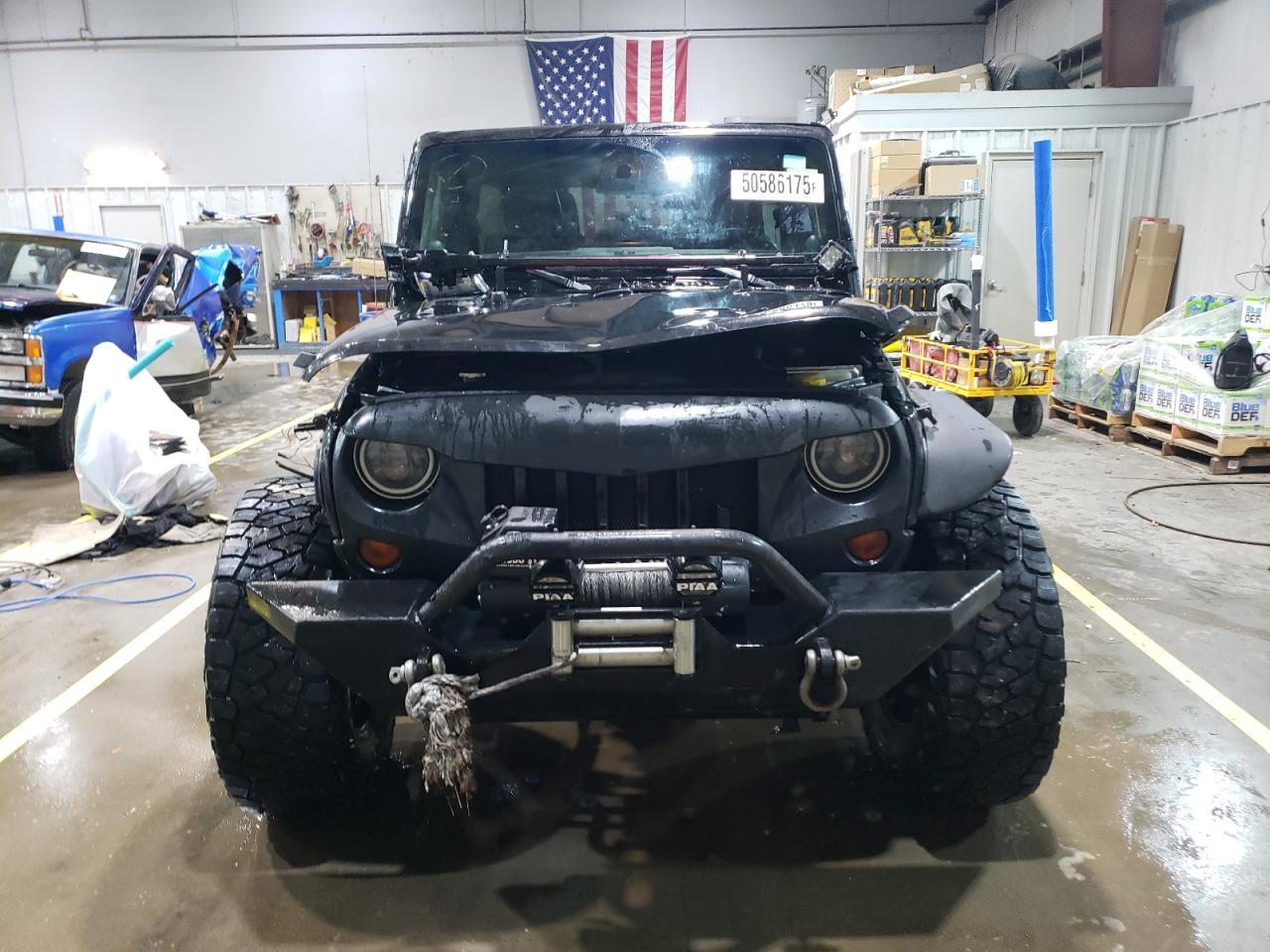 2012 Jeep Wrangler Unlimited Sahara - Фото 5