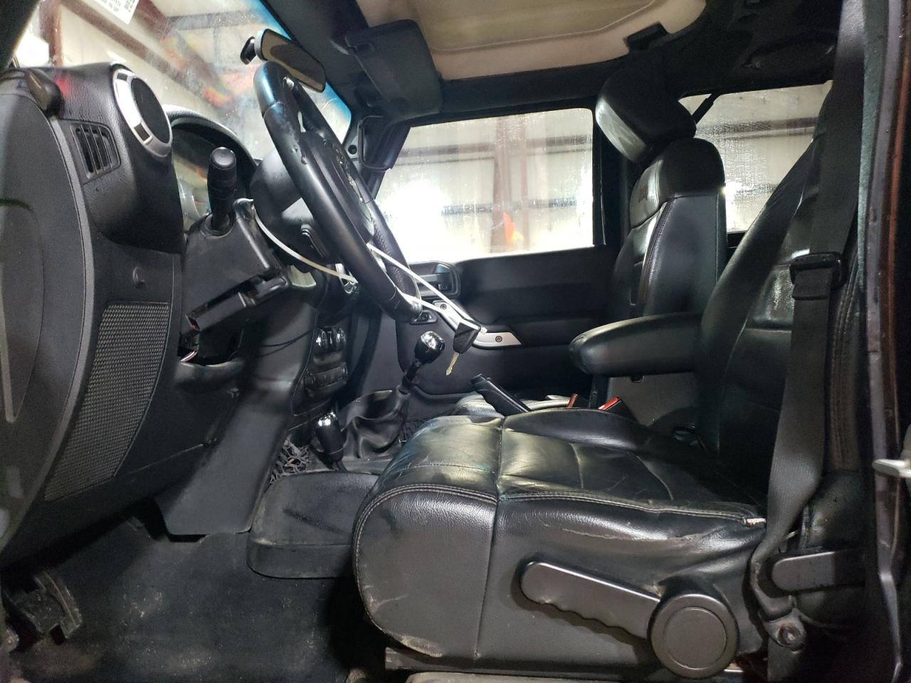 2012 Jeep Wrangler Unlimited Sahara - Фото 7