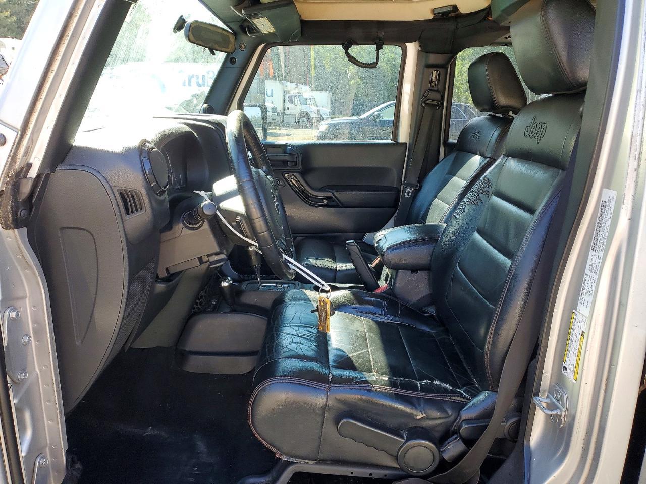2012 Jeep Wrangler Unlimited Sahara - Фото 7