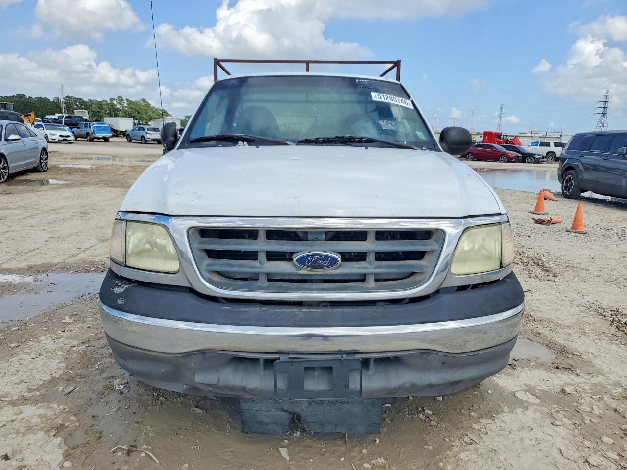 2003 Ford F150 - Фото 5
