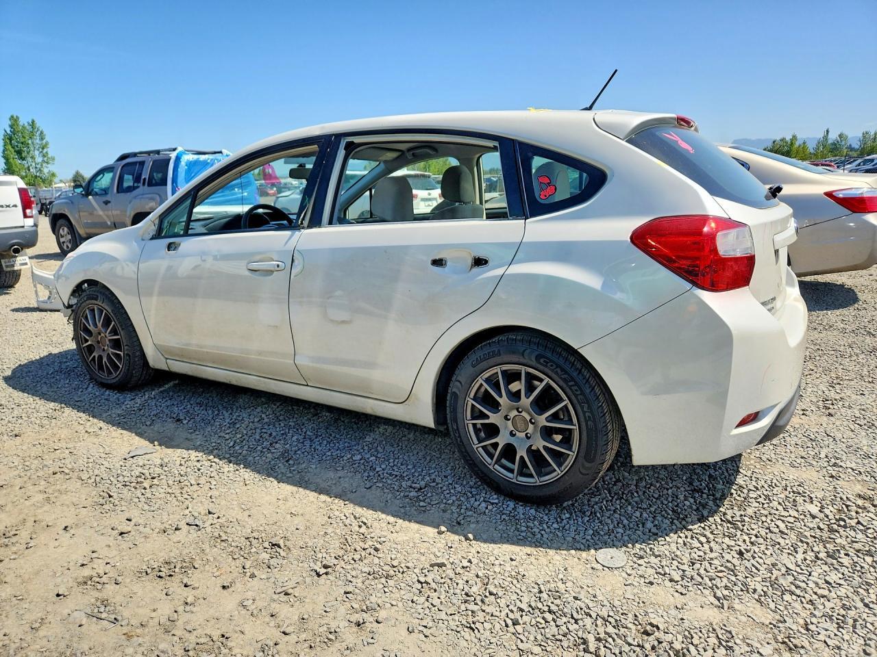 2014 Subaru Impreza Premium - Фото 2