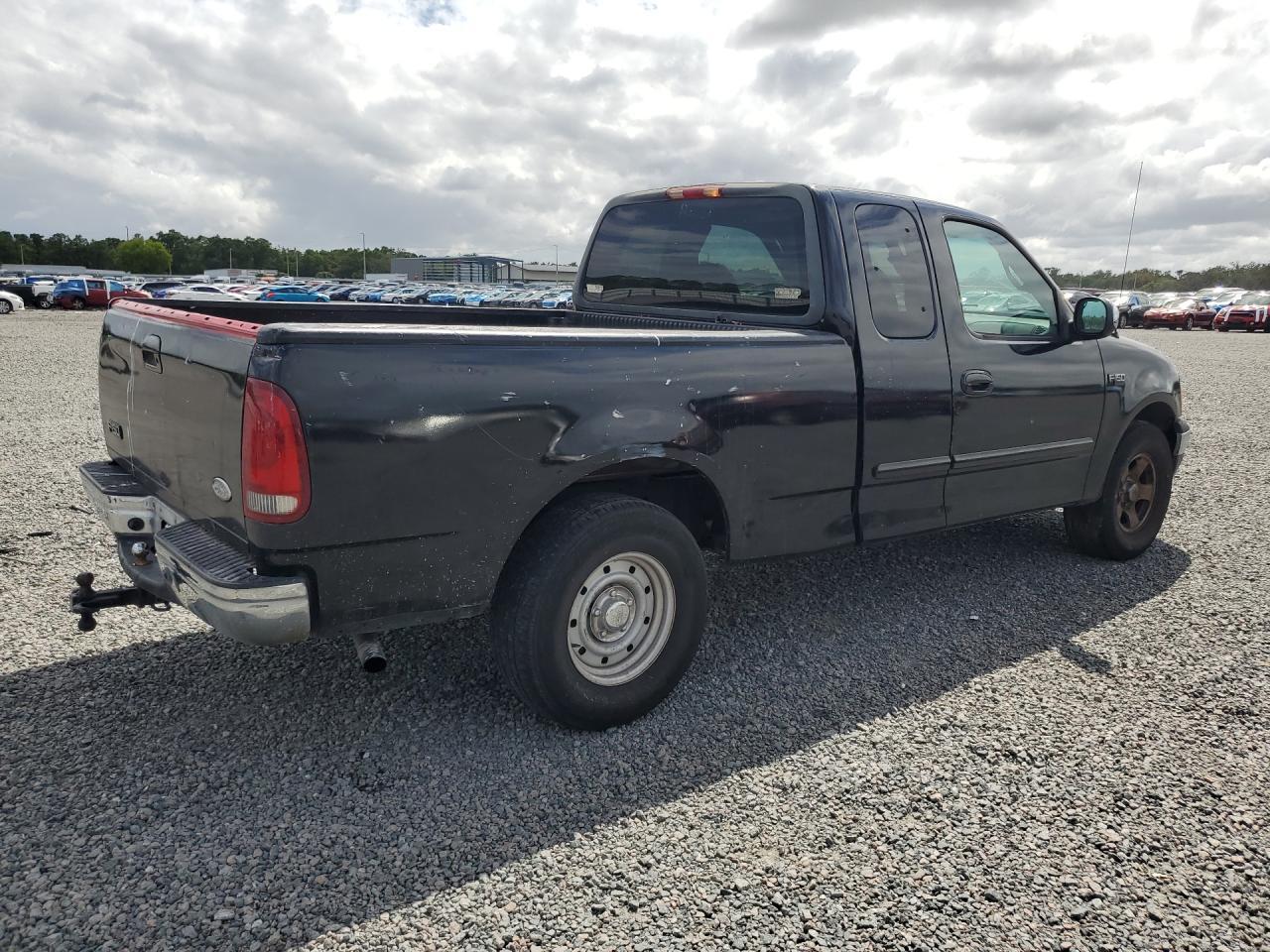 2000 Ford F150 - Фото 3