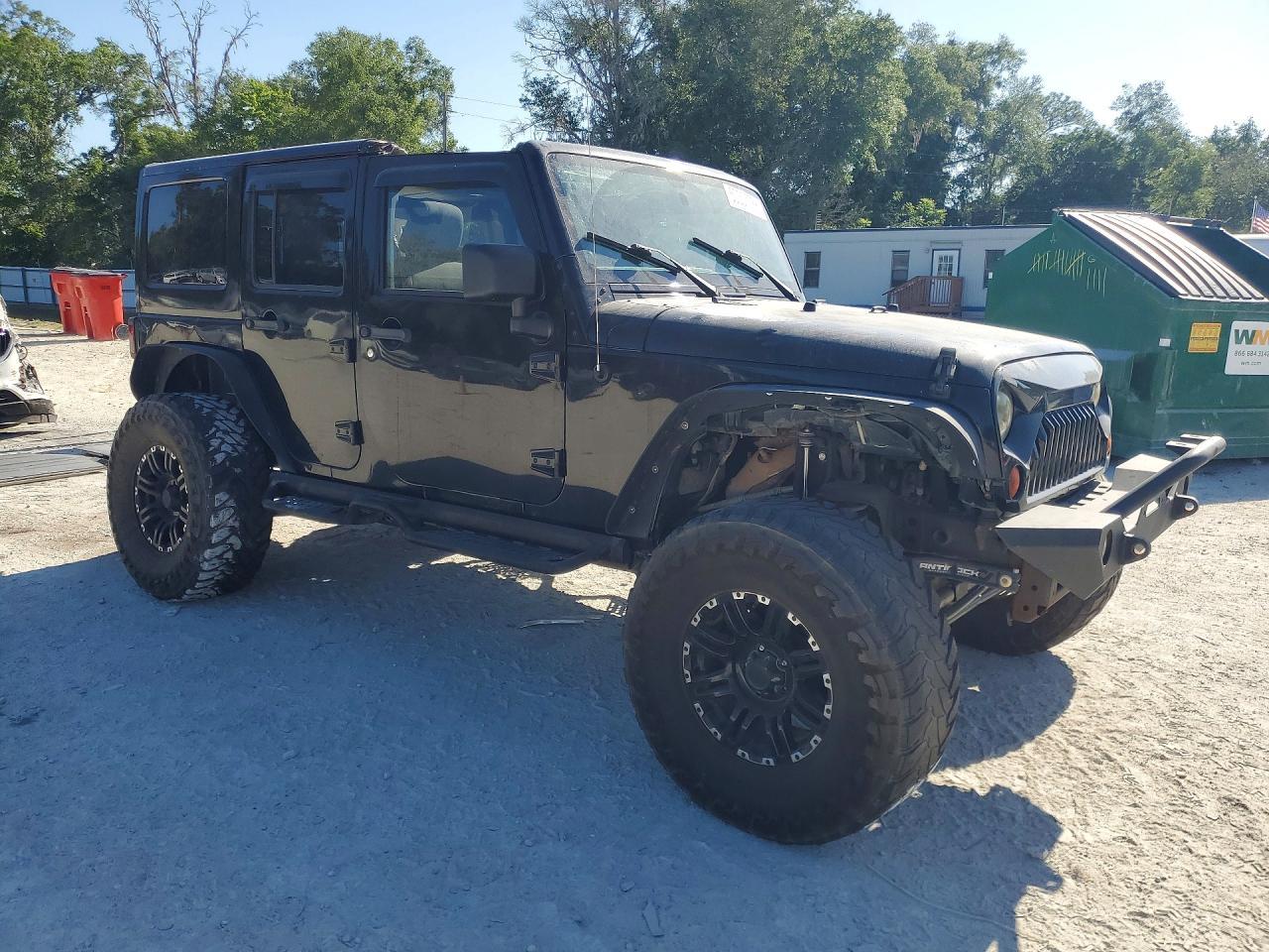 2012 Jeep Wrangler Unlimited Rubicon - Фото 4