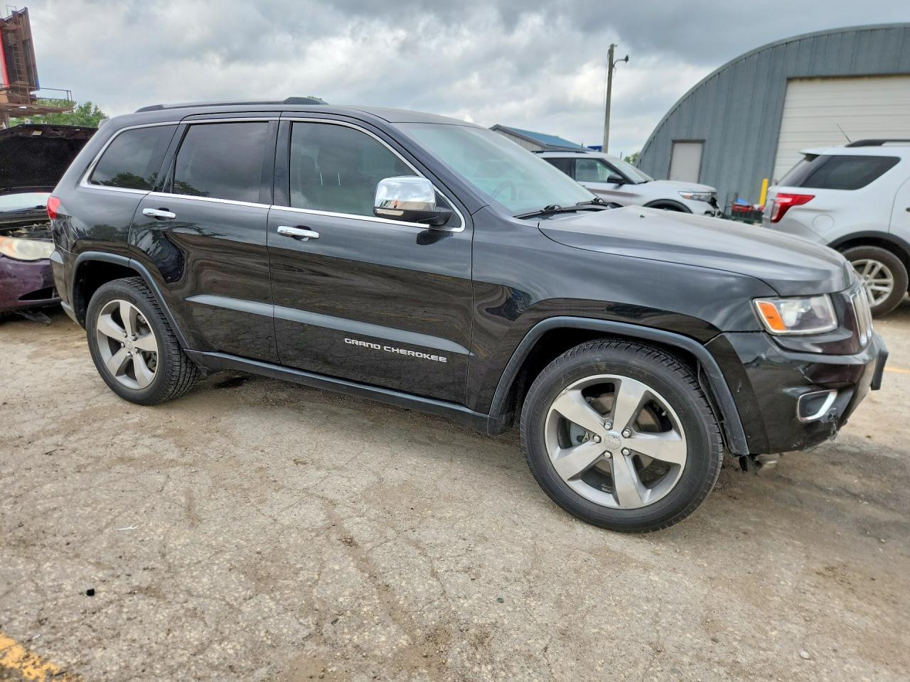 2014 Jeep Grand Cherokee - Фото 4