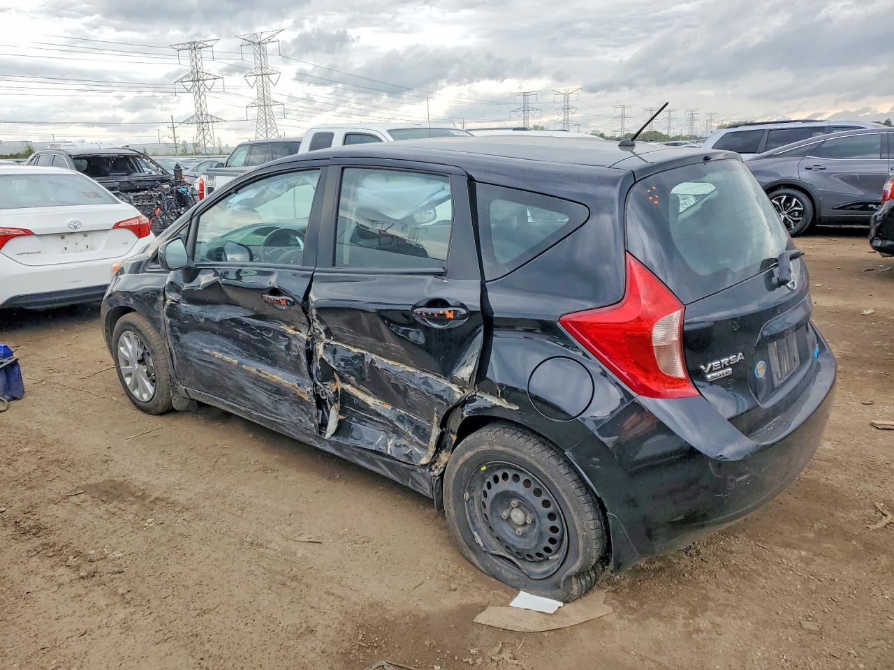 2016 Nissan Versa - Фото 2