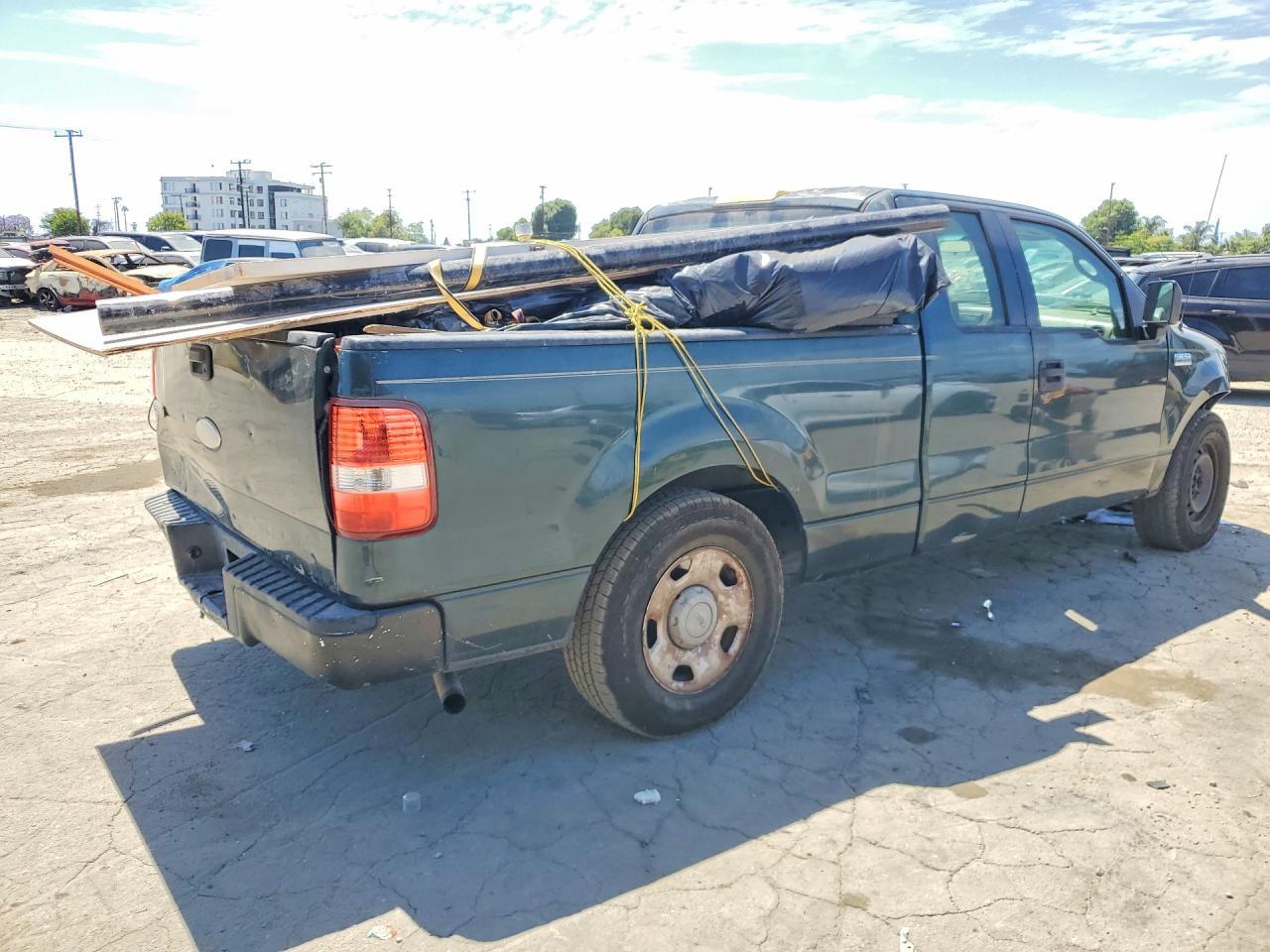 2006 Ford F150 - Фото 3