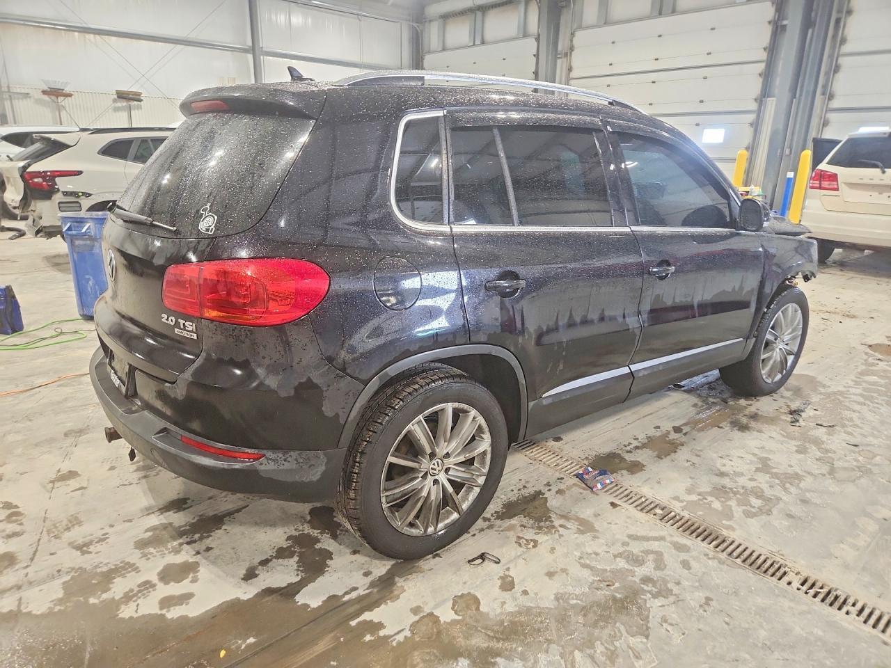 2012 Volkswagen Tiguan S - Фото 3