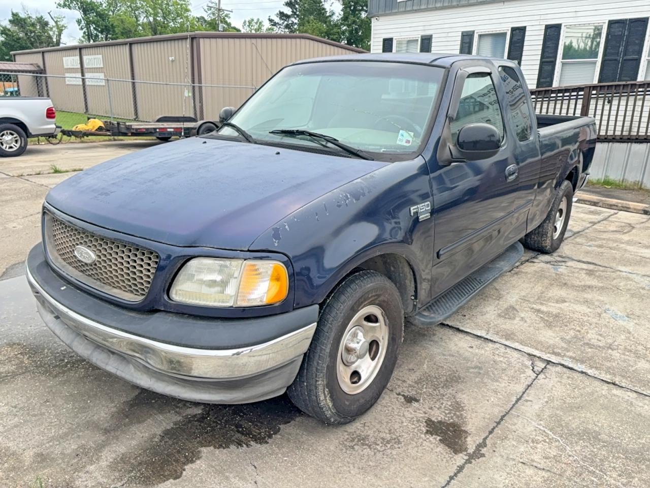 2002 Ford F150 - Фото 2
