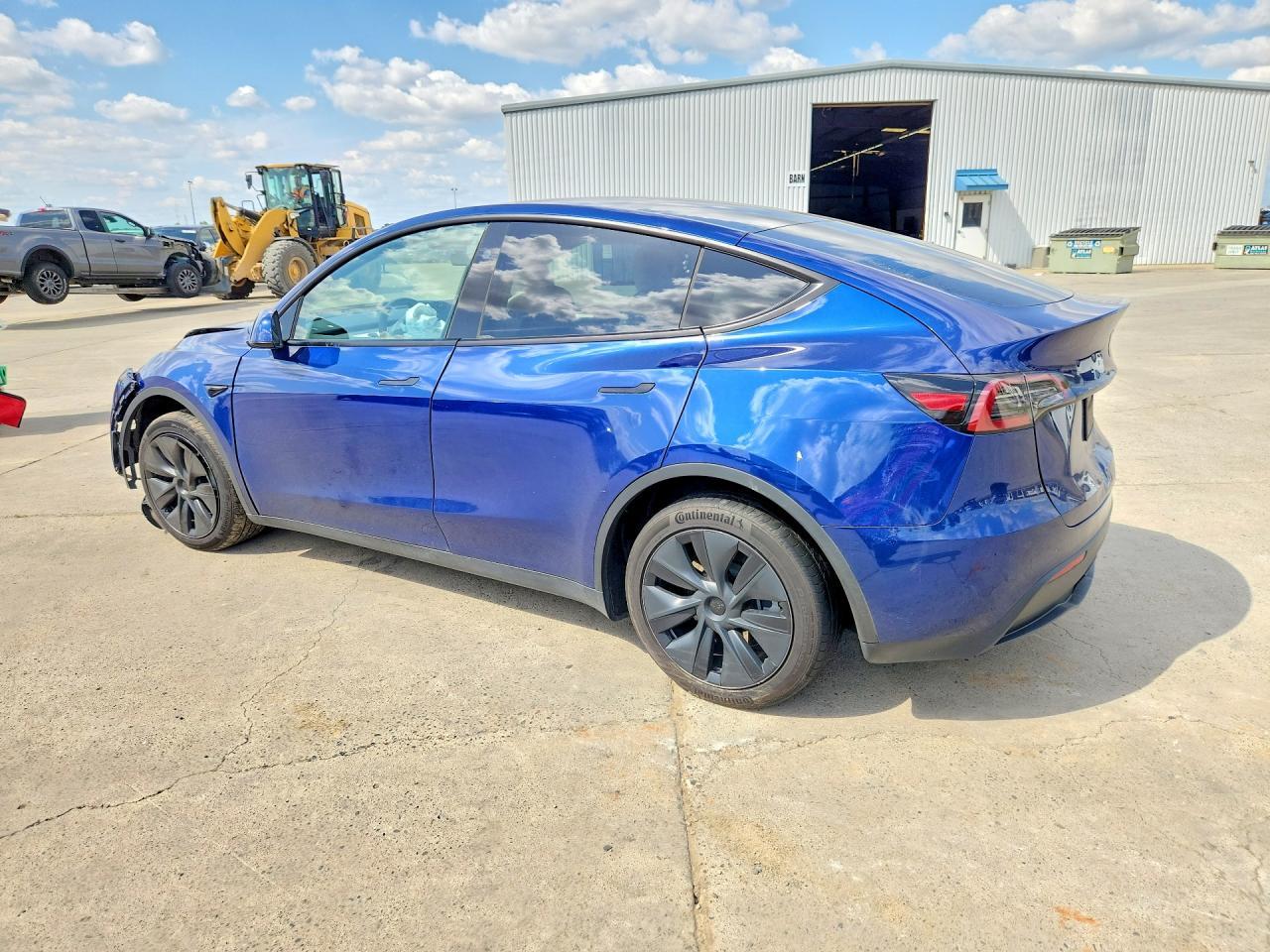 2025 Tesla Model Y - Фото 2