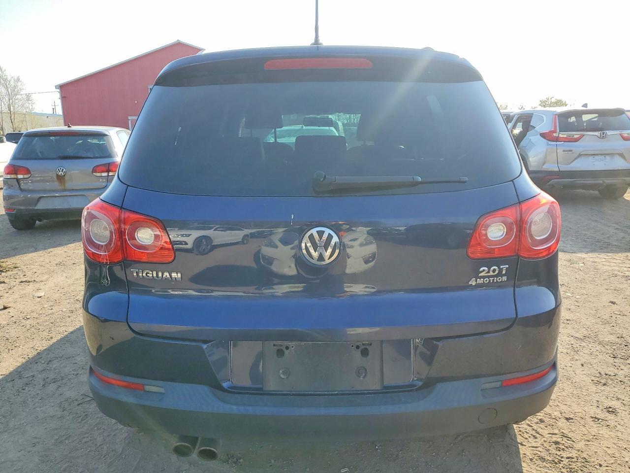 2011 Volkswagen Tiguan S - Фото 6