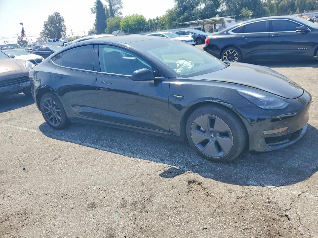 2023 Tesla Model 3 - Фото 4