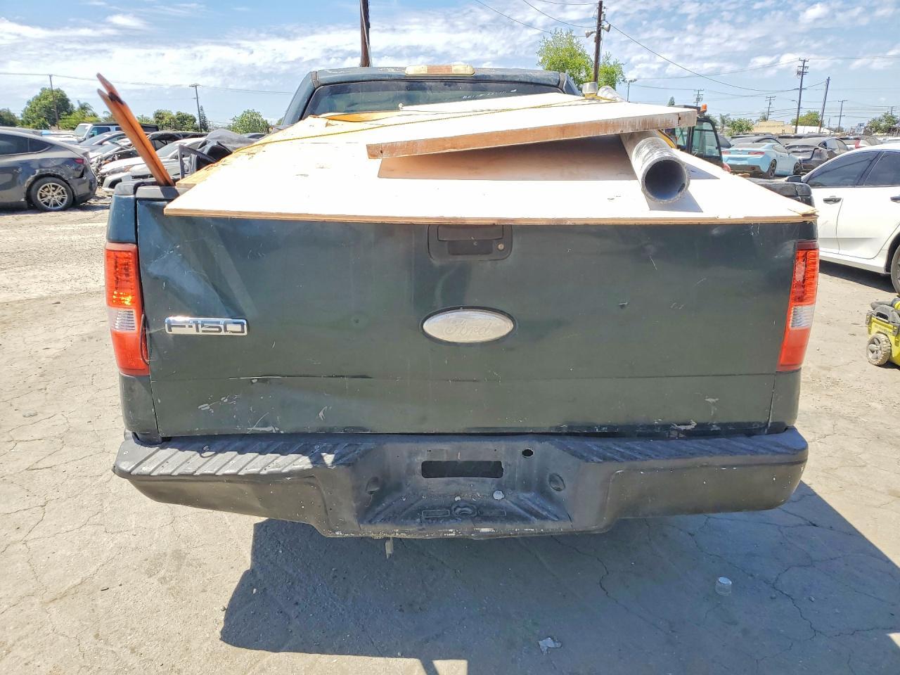 2006 Ford F150 - Фото 6