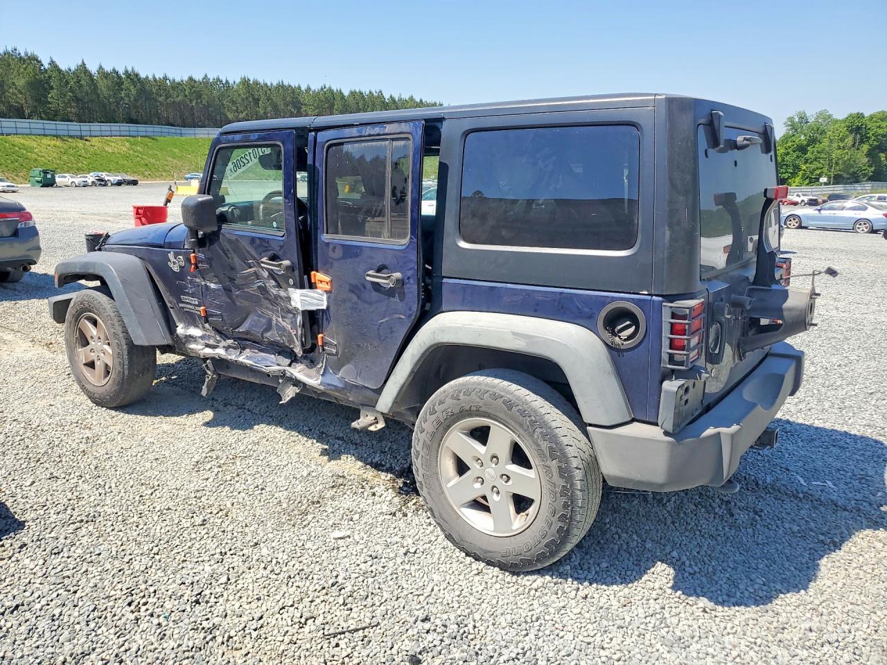 2013 Jeep Wrangler Unlimited Sport - Фото 2