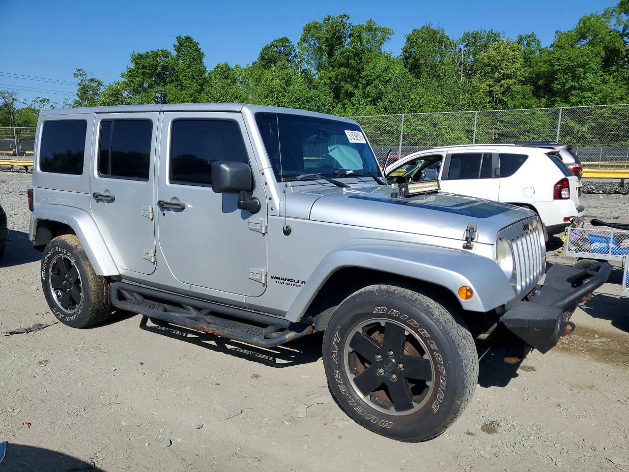 2012 Jeep Wrangler Unlimited Sahara - Фото 4