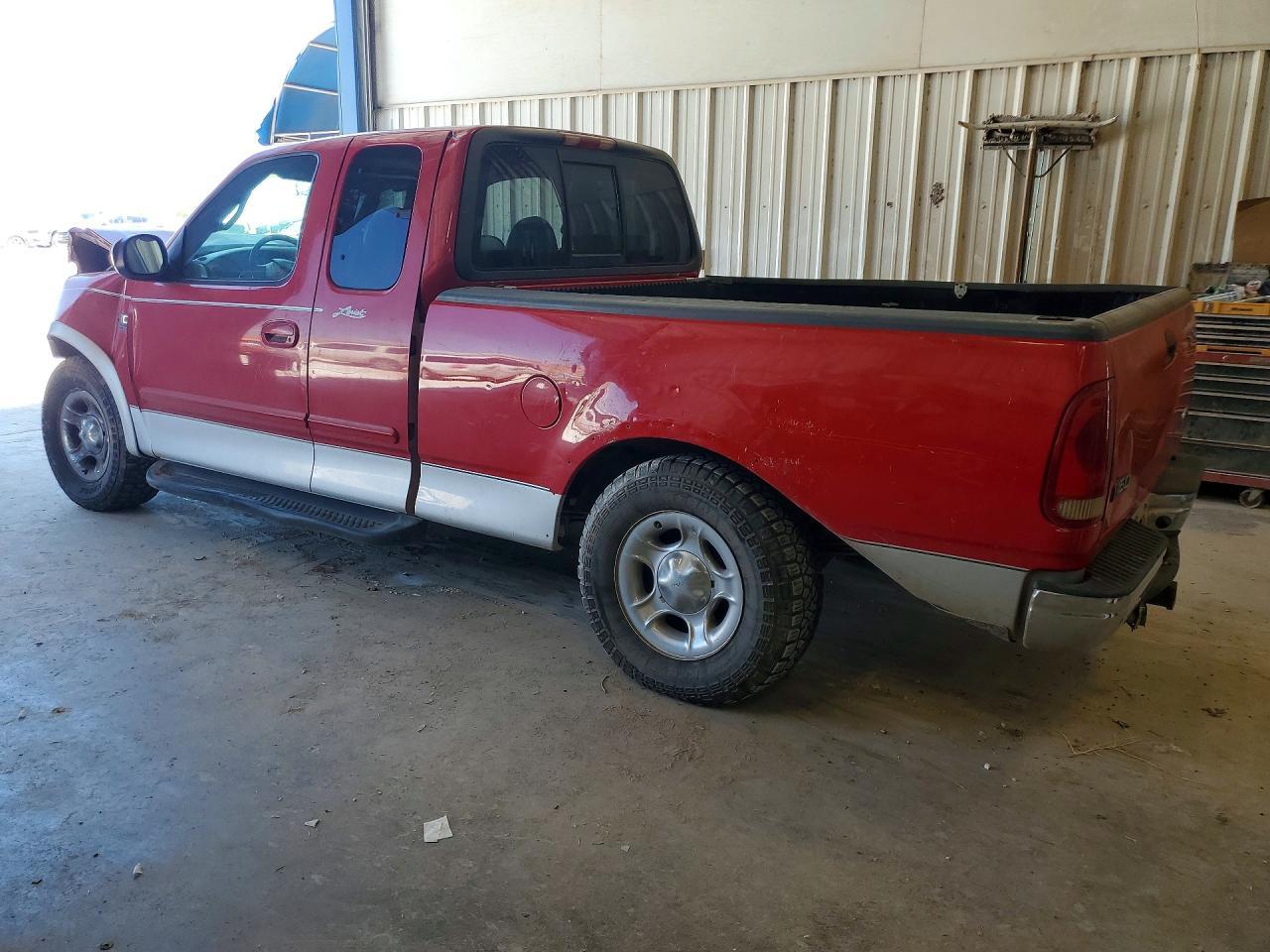 2001 Ford F150 - Фото 2